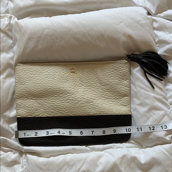 kate spade Handbags - Kate Spade Black and Cream Striped Clutch